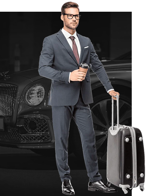Executive traveler beside a luxury vehicle